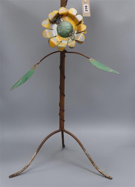 A painted tin floral tripod stand height 102cm